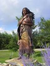 bronze monument of Sacagawea with her baby on the Lewis and Clark Expedition