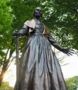 bronze statue of former slave, abolitionist and women's rights activist in the 19th century