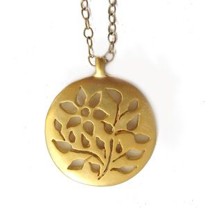 gold pierced floral medallion necklace