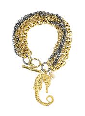 gold bracelet with seahorse charm