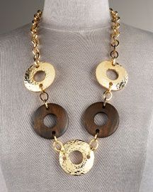 designer necklace with wooden rings and hammered gold rings on a chain