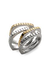 four sterling silver and 18k gold stacking rings