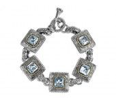 silver and gold blue topaz link bracelet