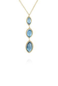 gold and faceted blue topaz necklace