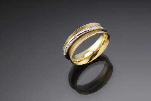 diamond and white and yellow gold ring