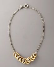 silver necklace with 10K yellow gold rings