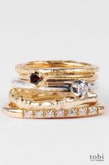 gold stack rings with gemstones and crystals