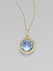 blue topaz and diamond pendant