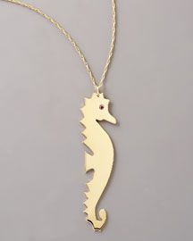gold seahorse pendant on gold chain