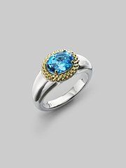 gold, silver and blue topaz ring