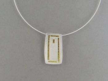 silver and 22K yellow gold pendant