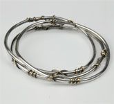 sterling silver and bronze bangles