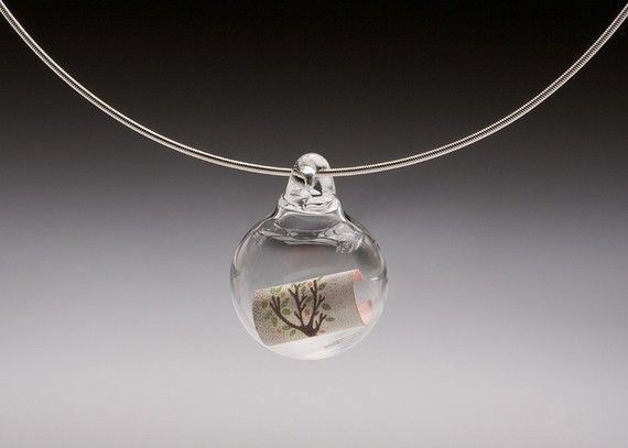 clear glass bubble necklace on a neckwire