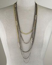 gunmetal and gold chains with stones