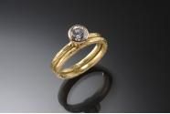 18K yellow gold engagement ring and wedding band