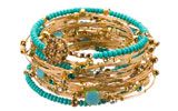 set of gold and turquoise bracelets