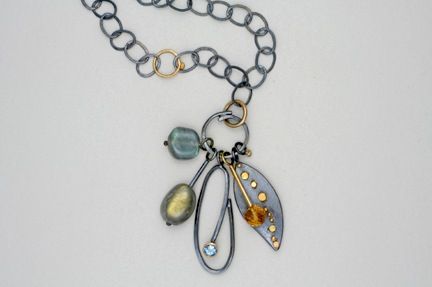 oxidized silver and gold bead charm necklace