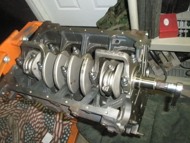 http://i157.photobucket.com/albums/t48/my1stpeanut/Talon%20motor%20build%202010/rodsandpistons2007.jpg