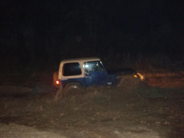 http://i157.photobucket.com/albums/t48/my1stpeanut/muddyjeep.jpg